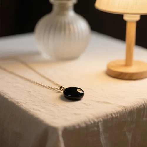 Artisan hand-polishing obsidian ornament