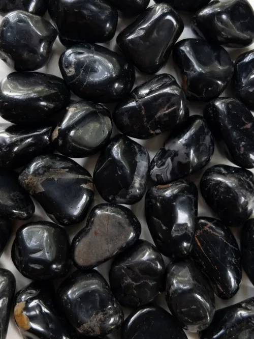 Close-up of translucent obsidian edge illuminated by sunlight