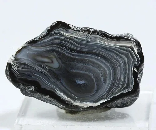 Handcrafted obsidian knife and carved ceremonial arrowheads