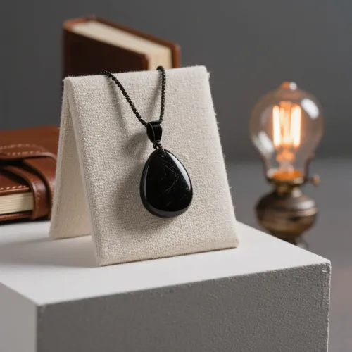 Obsidian mirror reflecting human eye