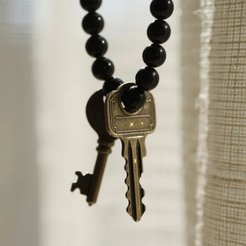 Obsidian variations showing color banding and iridescent layers