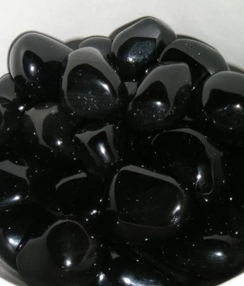 Volcanic eruption lava flow meeting ocean water with steam clouds